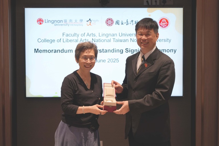 presenting souvenirs to Dean Shiu