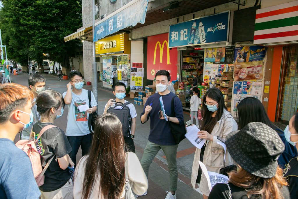 Students participate in a community walk in Tuen Mun with a creative writing instructor