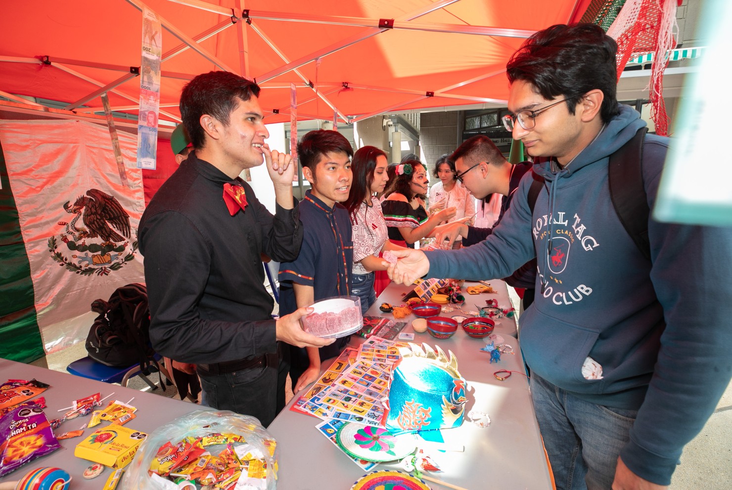 Students from Mexico have prepared a variety of snacks and showed typical Mexican toys.