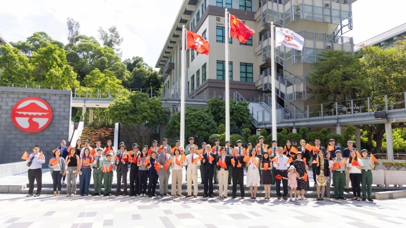Lingnan University celebrates National Day with a flag-raising ceremony, and presents 7,500 PureAuras to residents of Sham Shui Po subdivided units