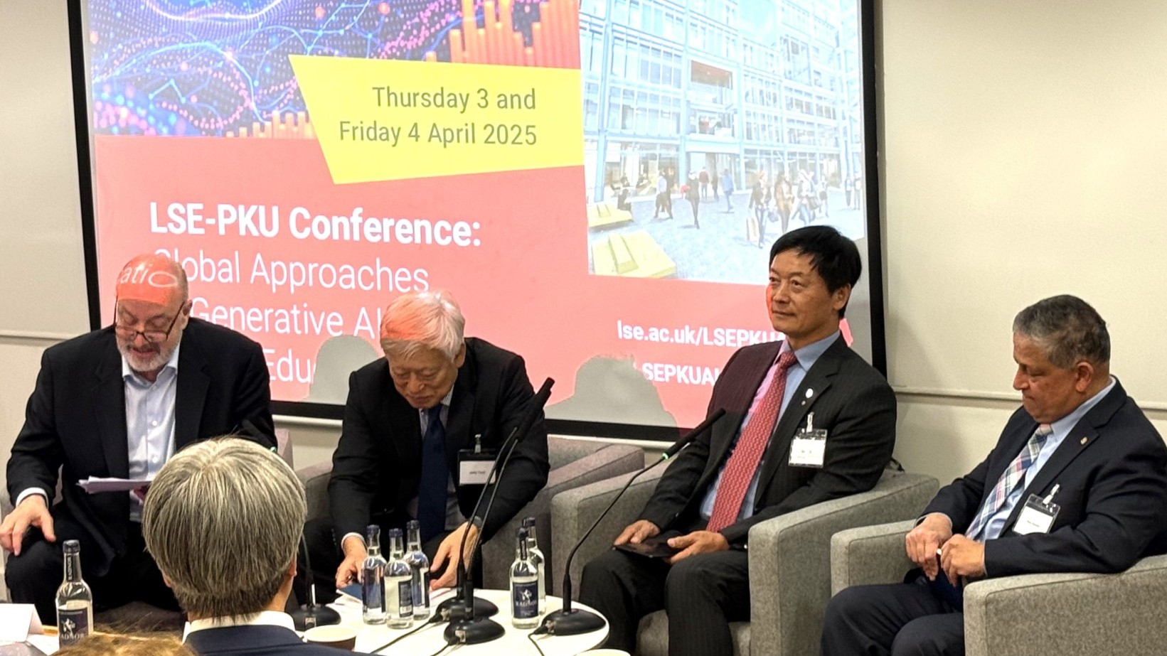 President S. Joe Qin (second right) participates in an international conference co-hosted by Peking University and the London School of Economics and Political Science.