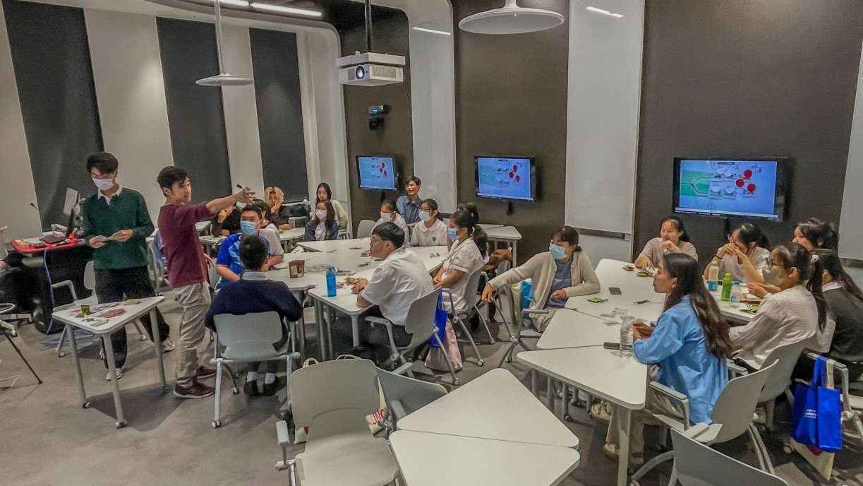 Prof Elton Chan Wing-ching fascinates prospective students with a game workshop based on the classic philosophy trolley problem.