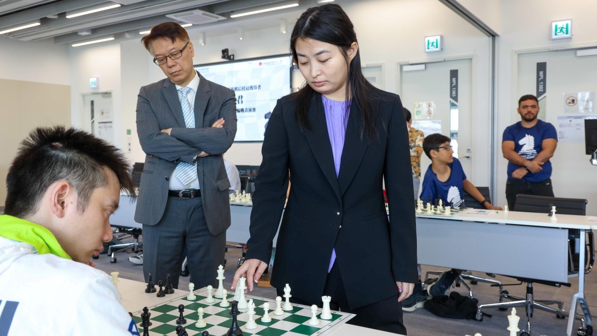 Ms Ju Wenjun playing in the exhibition match.