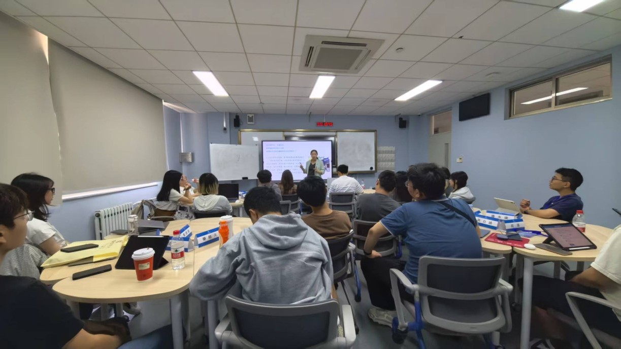 Students attend a Chinese writing class.