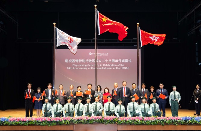Participants wave the national flags and participate in the ceremony.