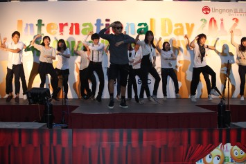 A group of Korean exchange students performing "Gangnam Style", a Korean pop-dance.