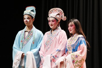 A young gentleman (middle), a lady (right) and a villain (left) are typical characters in a Cantonese opera performance.