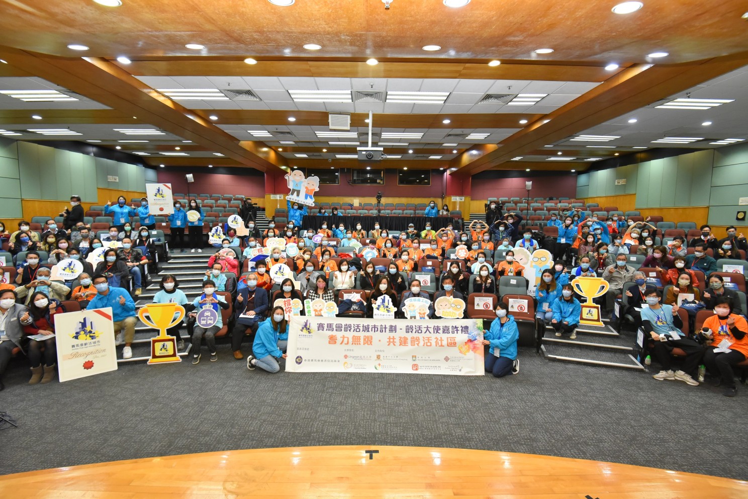 Officiating guests take a group photo with the Project Ambassadors at the Ceremony.