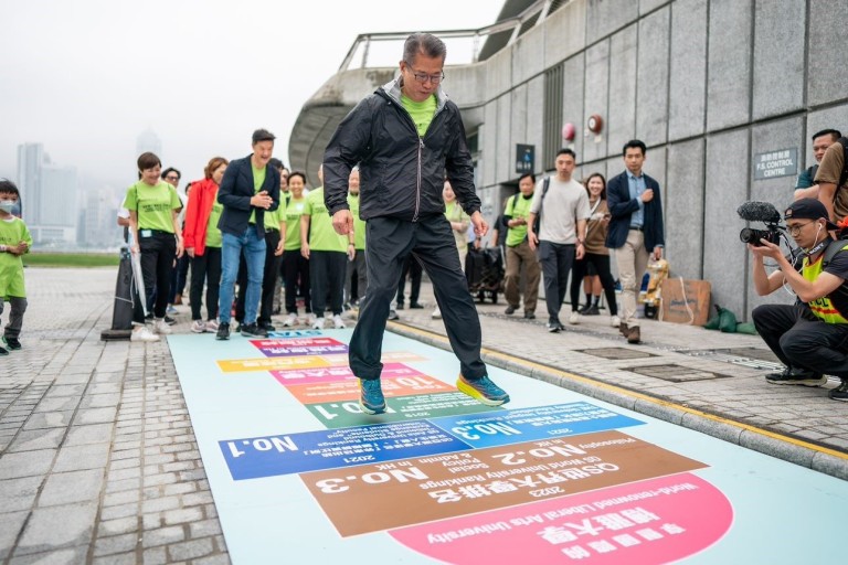 Financial Secretary the Honourable Paul Chan Mo-po and participants challenge checkpoints during the walk.