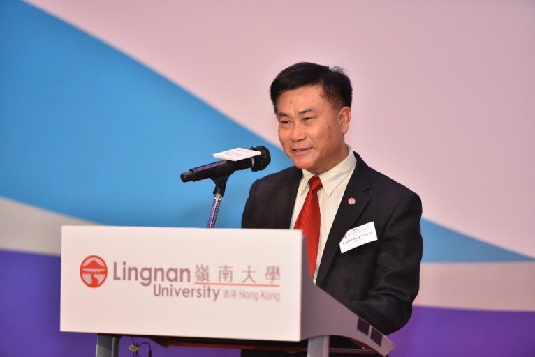 President Leonard K Cheng delivers an address.