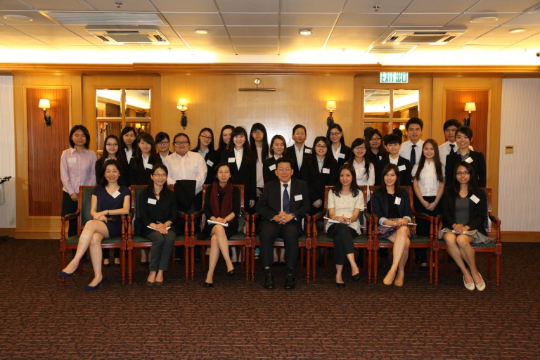 A group photo of guests and scholarship recipients at the sharing session.
