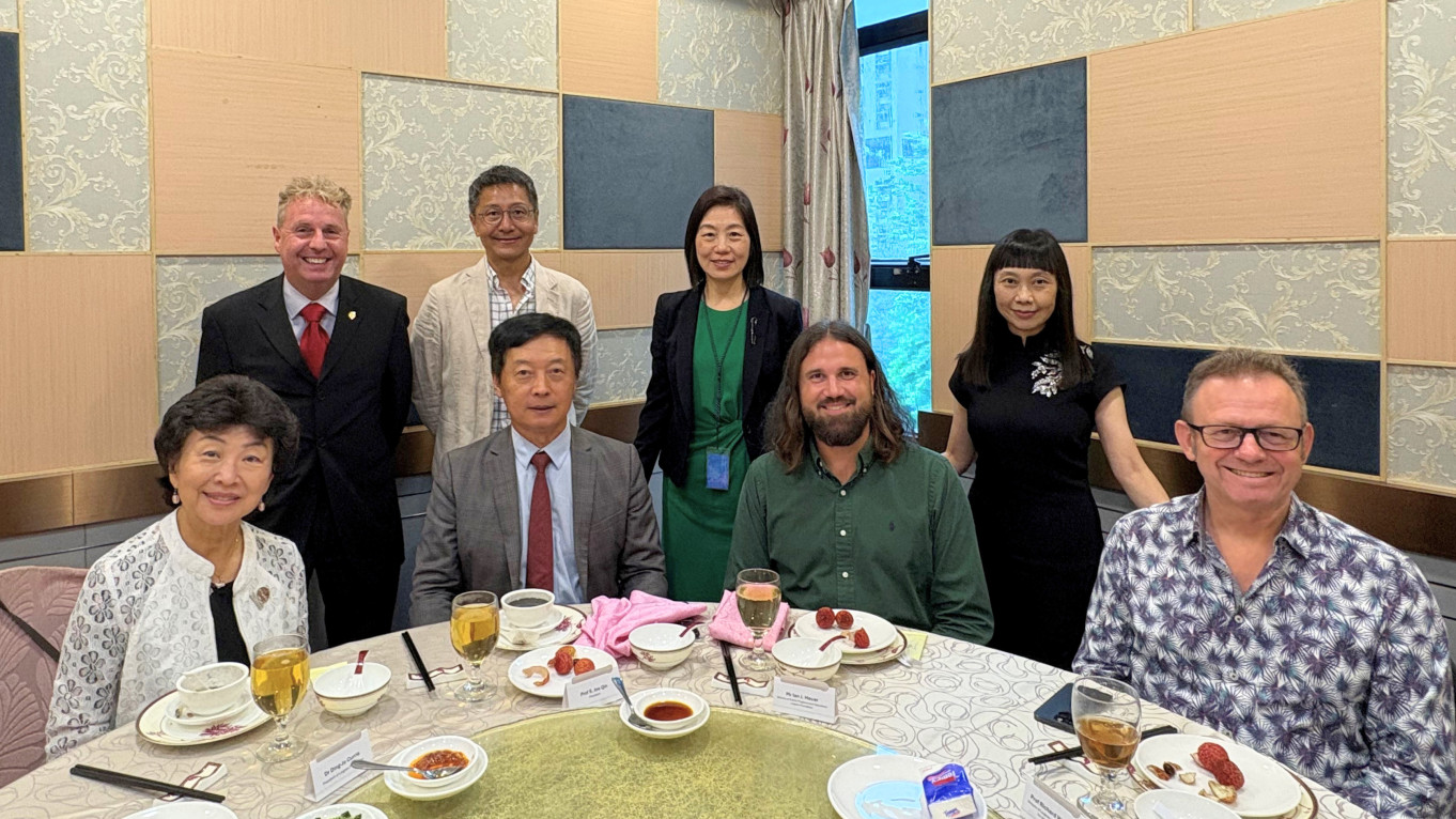 Group photo of guests at luncheon. (Front row from left: Dr Ding-Jo Currie, President S. Joe Qin, Mr Ian Heuer and Prof Richard Walker; back row from left: Prof Bradley Barnes, Prof Albert Ko, Ms Jessie Law and Ms Irene Ng)