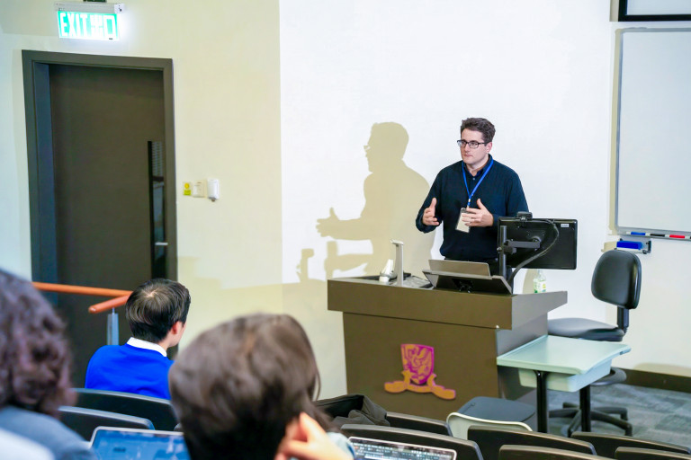 Dr Maciej Kurzynski presents his research during an HKADH 2026 session at CUHK