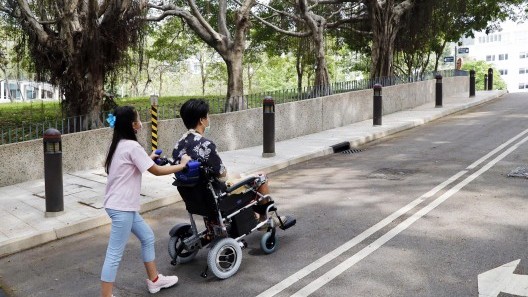 CREW Wheelchair: carer-driven electric wheelchair