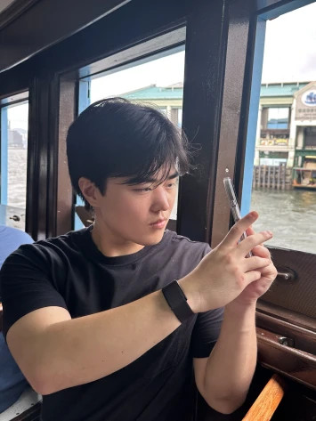 South Korean student photographing views on Hong Kong’s Star Ferry