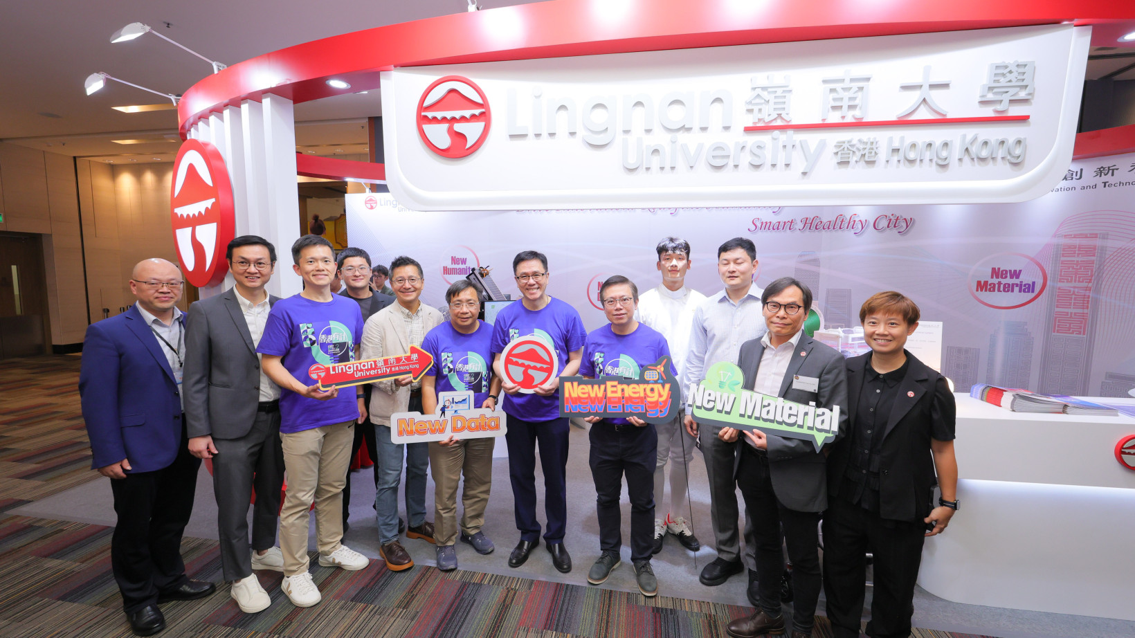 Prof Sun Dong, Secretary For Innovation, Technology and Industry (6th right); Mr Ivan Lee, Commissioner for Innovation and Technology (6th left); Mr Philip Har, Deputy Commissioner for Innovation and Technology (3rd left); and Mr Terry Wong, Chief Executive Officer of the Hong Kong Science and Technology Parks Corporation (5th right), visit Lingnan University's booth