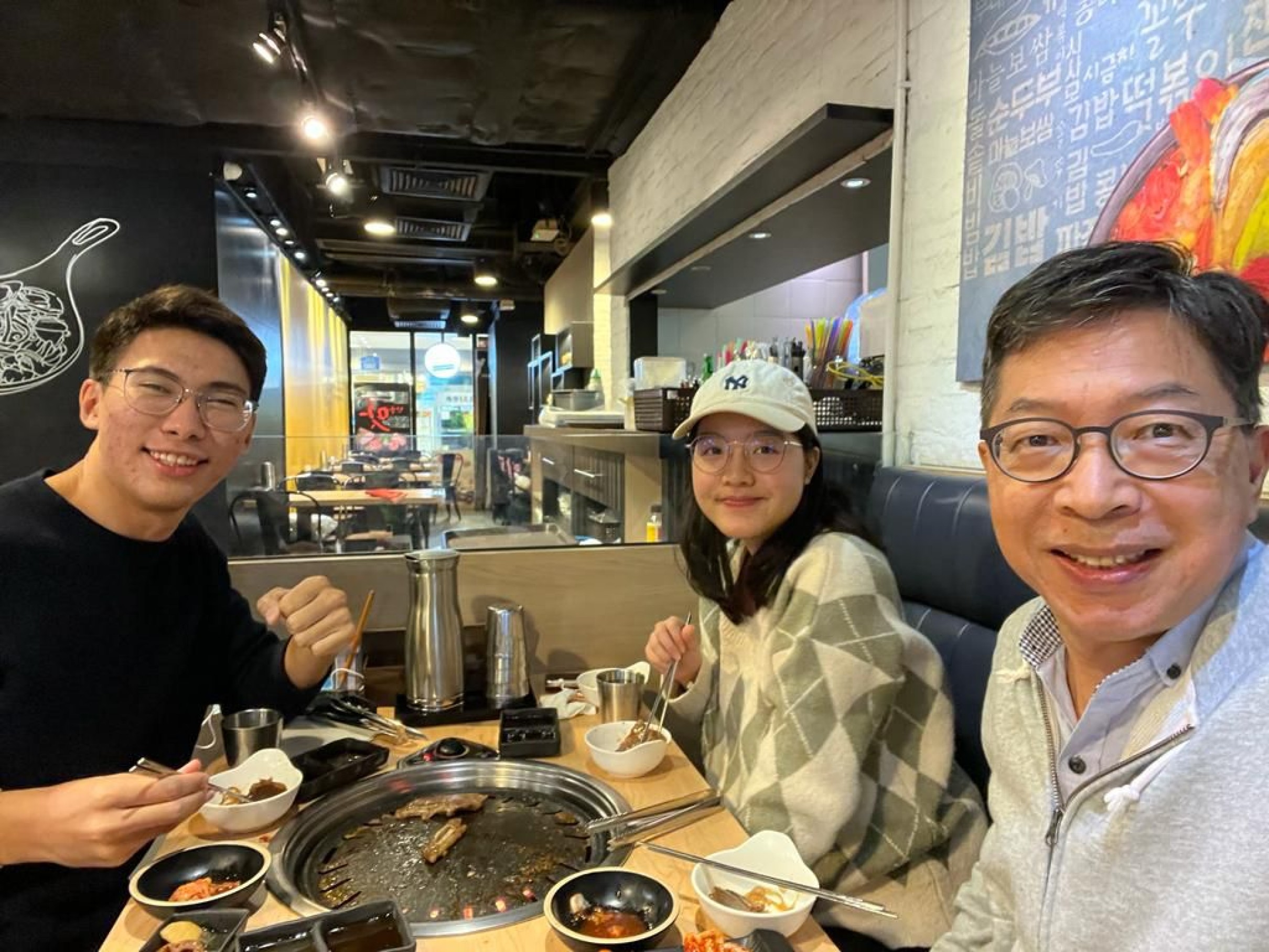Host Father Dr. LAM Man Chuen, Frank had a BBQ dinner with his youngest daughter Charmaine and hostee Mr NURKAIDAR Temirlan