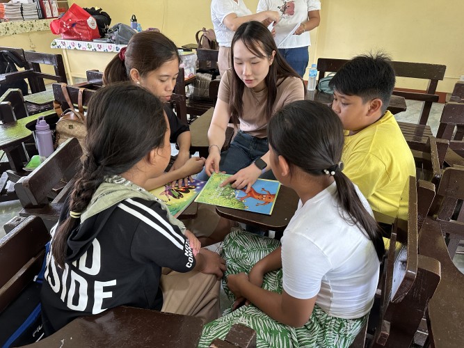 Students were leading a music and art workshop for local daycare children.