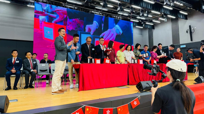 Celebrates National Day with a flag-raising ceremony, and presents 7,500 PureAuras