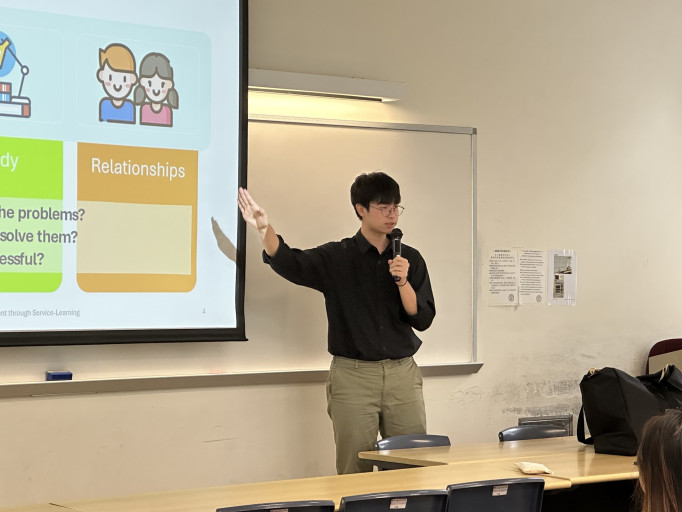  HIT Part-time Project Assistant delivering a workshop presentation.