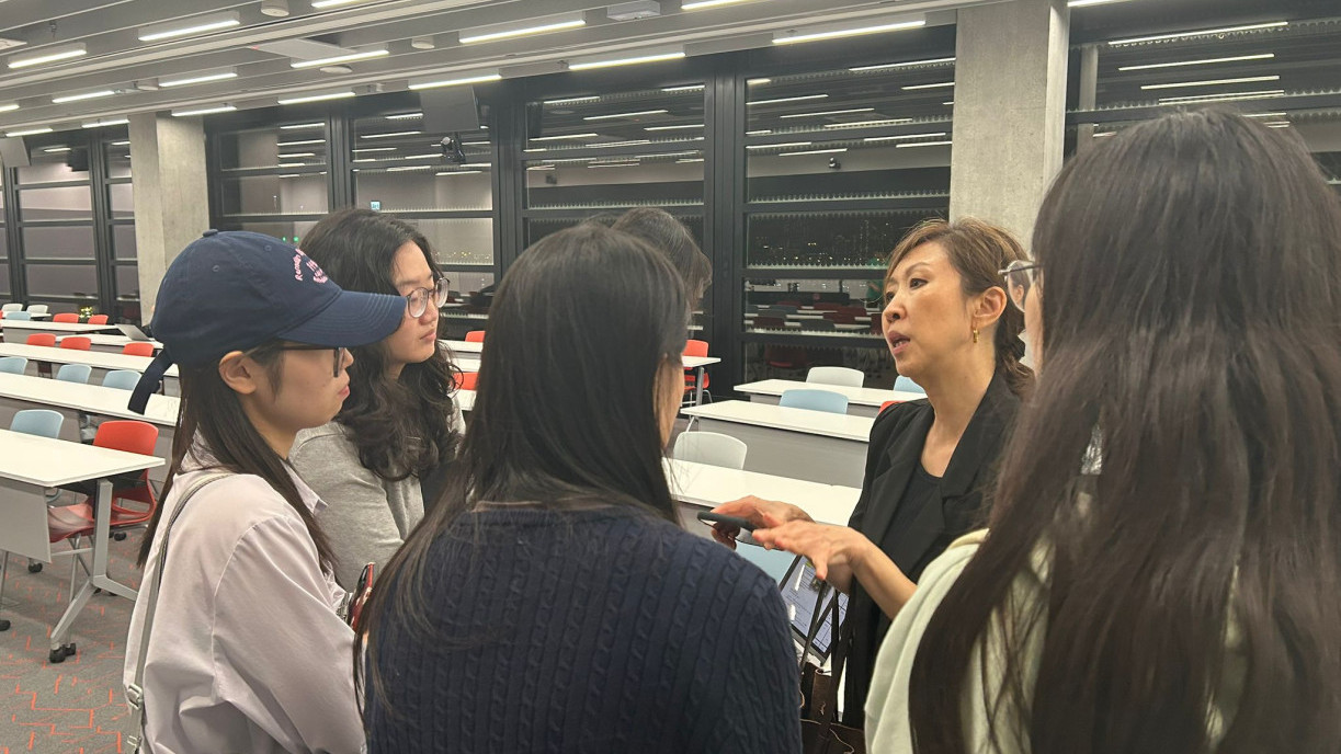 Ms Sandra Hong addresses student questions, deepening understanding after the workshop.