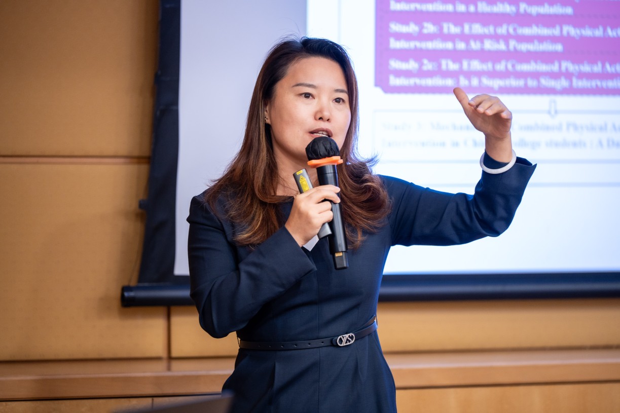 Prof Chi Xinli, Shenzhen University, delivering her keynote address on combined physical activity and mindfulness interventions for student mental health.