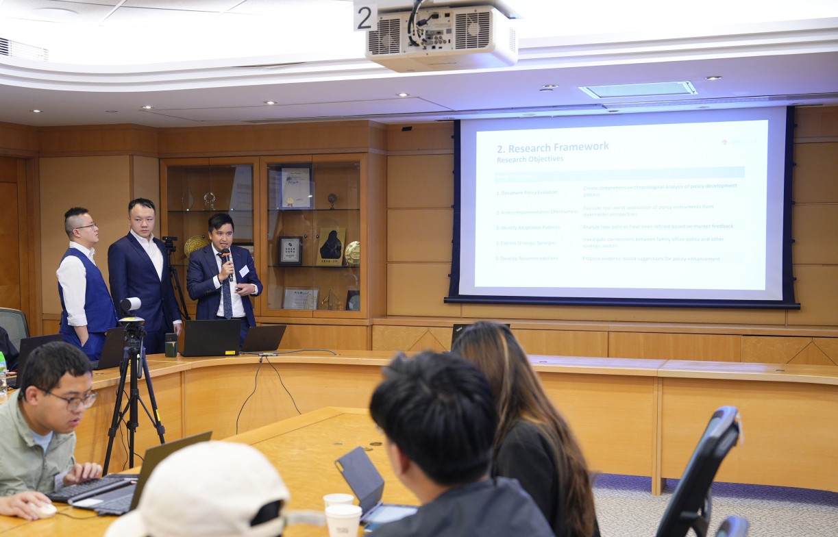 A DPS student group delivering their research presentation during the symposium.