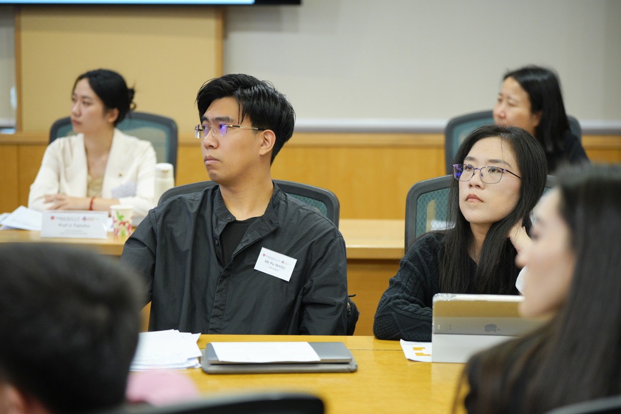 DPS students and participants attentively engaging with fellow presenters’ research findings. 