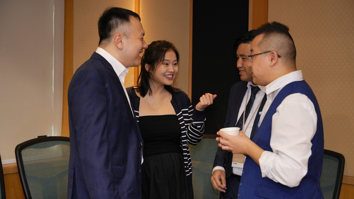 DPS students networking and exchanging ideas during the refreshment break, fostering collaboration and scholarly connections.