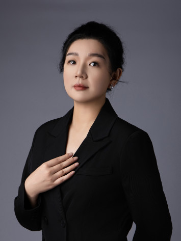 Connecting the World with a People-Oriented Approach: Xin Yan Advances Charitable Services with Innovative Technology