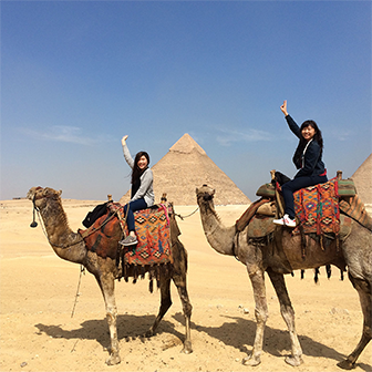 Two Students in Egypt Riding Camels